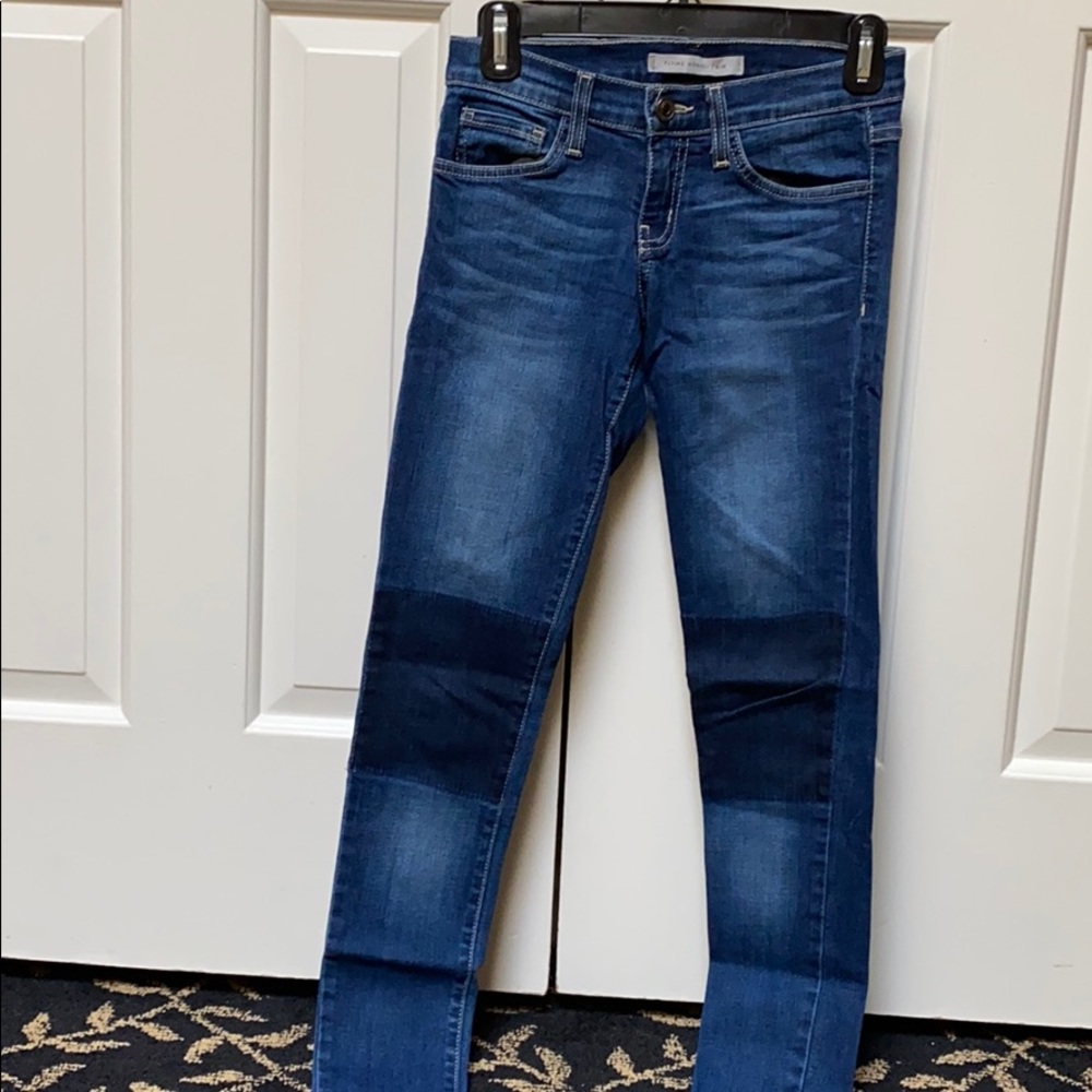 Blue skinny jeans w/ patchwork detailing